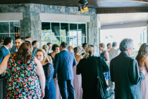 Wedding guests are getting together for the reception