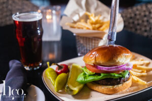 Hamburger with fries and pickles